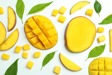 Ripe mango fruits on white background, top view