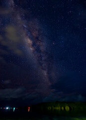 Milky Way night universe above tropical islands and water