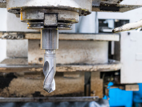 Large size twist drill for drilling hard materials. Upright drill press for metal work