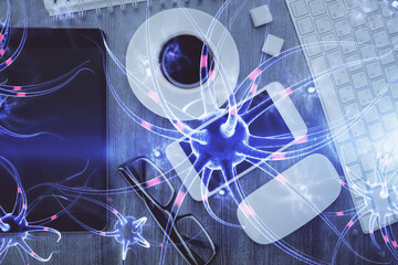 Double exposure of neuron drawing over table with phone. Top view. Science education concept.