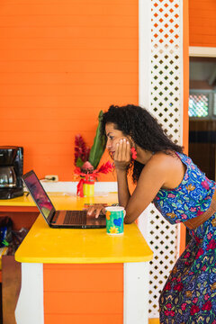 Latin Woman Using Laptop