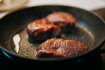 Cooking Meat On A Frying Pan
