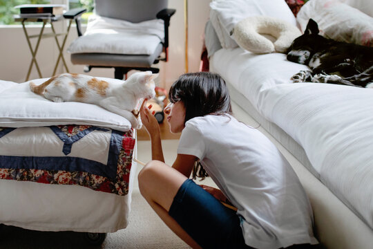 Girl enjoying time with pets