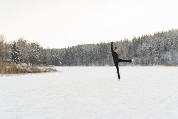 Woman Skating At Icy Lake