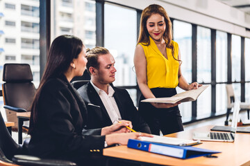 Group of professional business presentation meeting and discussing strategy with new startup project.Creative business people planning and brainstorm with laptop computer in modern office.Teamwork
