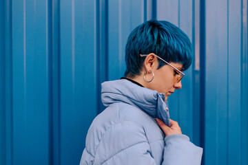 Stylish woman with blue hair