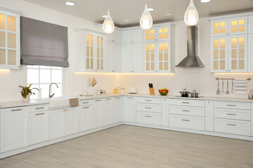 Modern kitchen interior with stylish white furniture