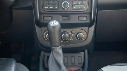 Knob for selecting the gear of a manual gearbox. Manual transmission knob in the car. Close-up of...