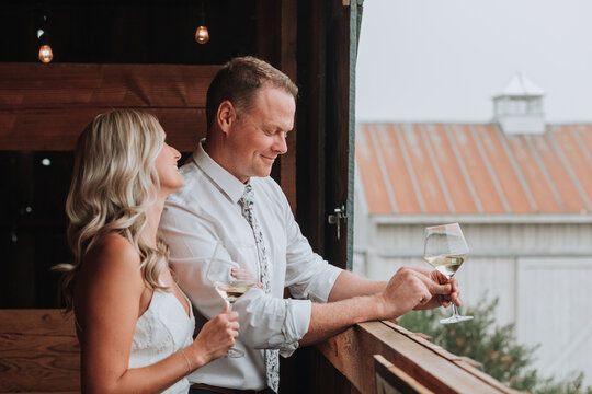 Wedding Couple Drinking Wine at Winery