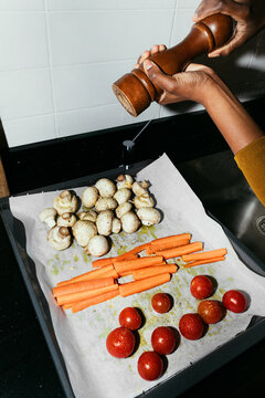 A Woman Salting Vegetables 