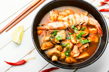 Tom yum soup with seafood and coconut milk