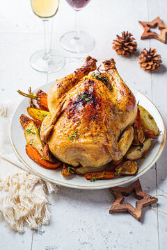 Christmas Baked Whole Chicken Stuffed With Thyme, Lemon And Vegetables.