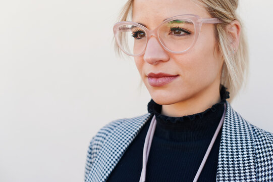 Confident young businesswoman wearing eyeglasses