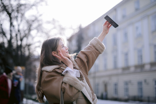 Woman talking with someone by video call 