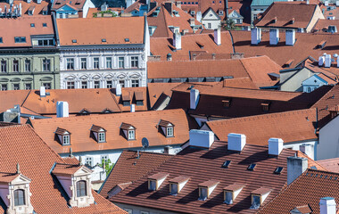 Prague cityscape - shot taken from Prague castle overlooking red rooftops in Mala strana - obrazy, fototapety, plakaty