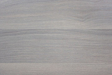 Fototapeta na wymiar Weathered cold temperature hardwood floor wall board texture with wood grain and swirls 