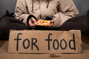 beggar with a sign for help,homeless asks for food