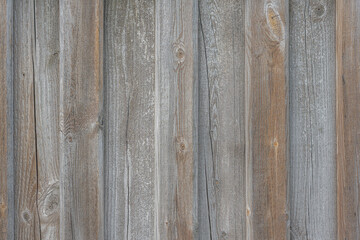 Obraz premium Old wooden wall with warm tones in bare texture and cracks