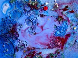 Beautiful acrylic color abstract background. Colored marble mixed ink abstraction.
