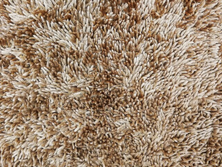 Brown carpettexture background. Fur artificial texture background fur fabric.