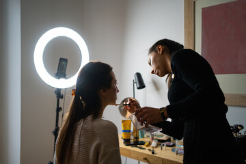 Content Creator Influencer Making Up At Home. 