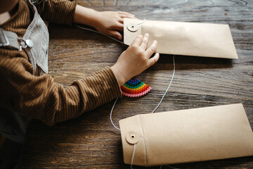 Blond boy packing his craft