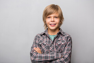 young teenager boy smiling isolated on white background