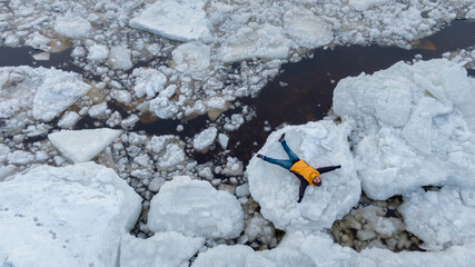 man chilling on the large iceberg 