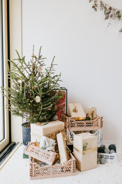 Close up of Christmas gifts and a Christmas tree