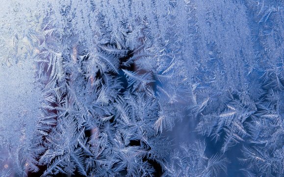 Frost crystals on glass macro abstract nature