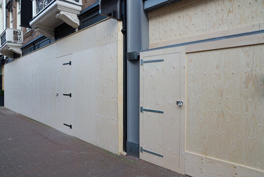 boarded up store window