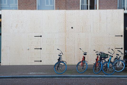 boarded up store window