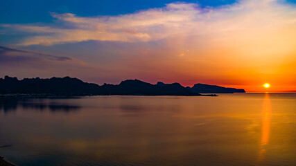 Obraz premium Sunrise Orange -Golden Our in Pollença Bay