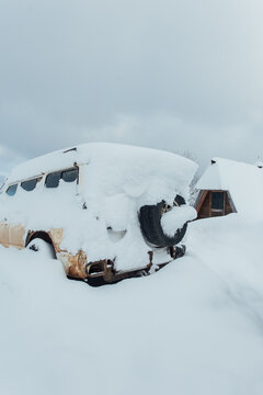 Jeep covered by snow