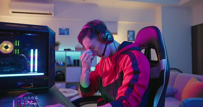 asian gamer has eyes pain