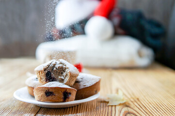 Holiday pastry muffins with falling sugar powder