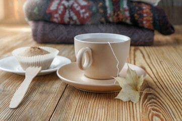 Autumn tea in warm colors with knitted sweaters