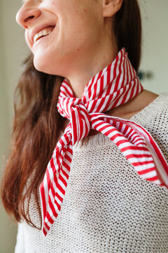 Woman wearing  striped scarf