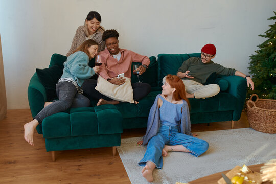 Friends party selfie on sofa at home 