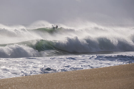 Surfing Large Storm Waves