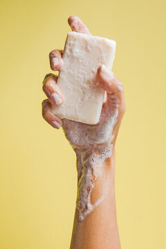 Hand holding a soap