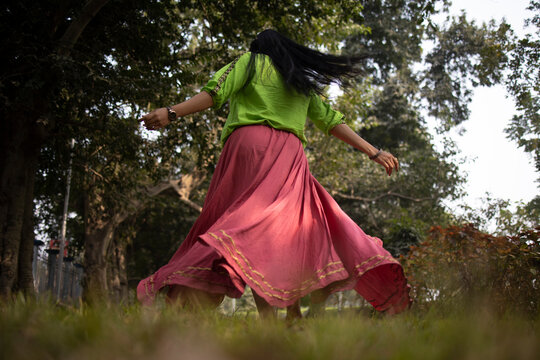 Young girl dancing at outdoors