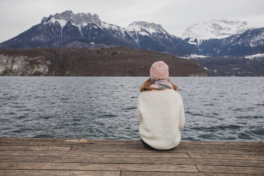 mindfulness, woman sitting alone near the lake