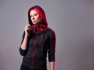 Kitsch style, fashion of the future. mixing styles. A young woman