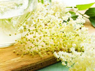 Elderberry flowers on wood