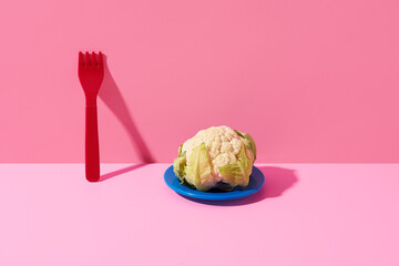 baby cauliflower in a blue plate