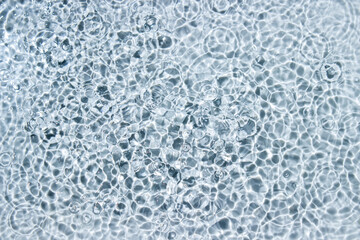 Circle ripples on water surface. Ripples on the water background. Pure clear water