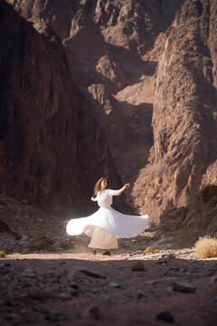 Sufi dance inside canyon 