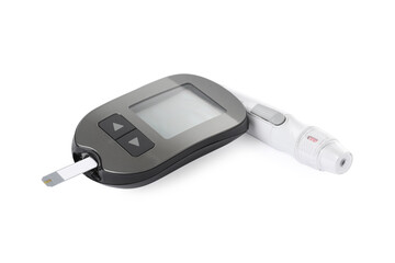 Digital glucometer and lancet pen on white background