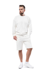 Man wearing blank white sweatshirt and shorts on white background